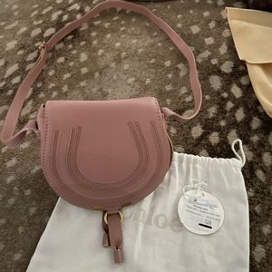 Chloe mini saddle bag.